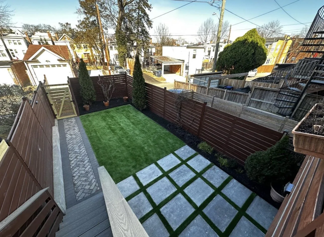 Synthetic turf lawn with clean edging in Virginia